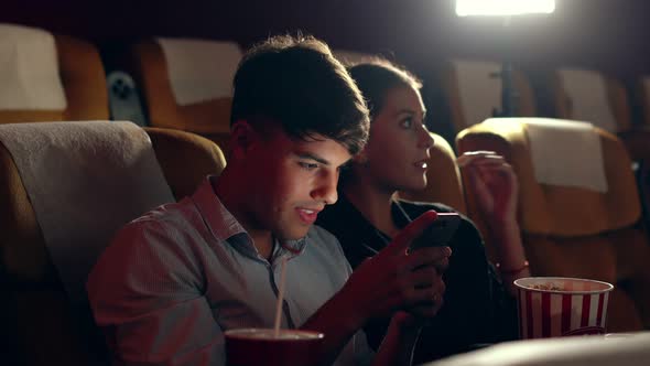 A Man Playing Mobile Phone Games