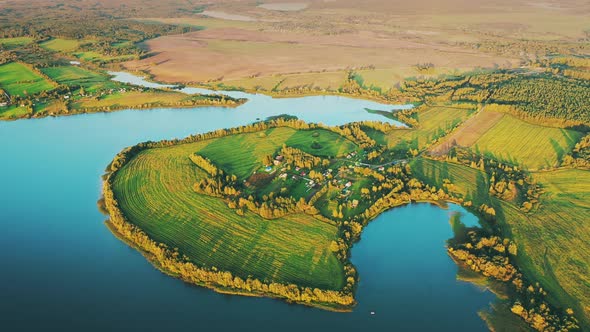 Aerial View Of Village Houses Near Lakes And Countryside Landscape