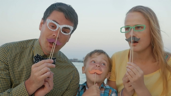 Family Of Three With Hipster Glasses And Moustache