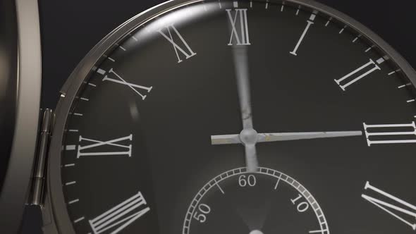 Closeup of Black Clock Face in Timelapse