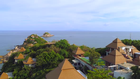 Flying over Hotel to small Island in Sea