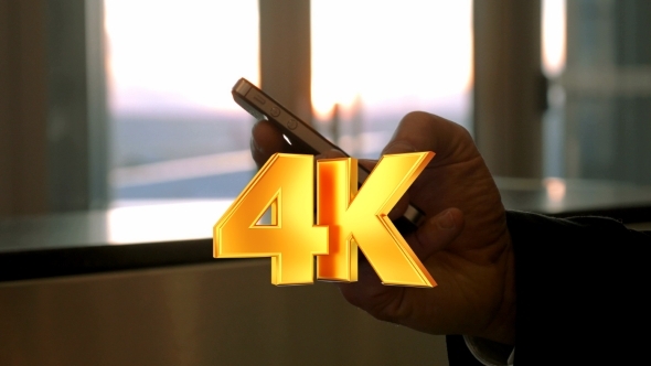 Man Using Cell To Type Text Message alt