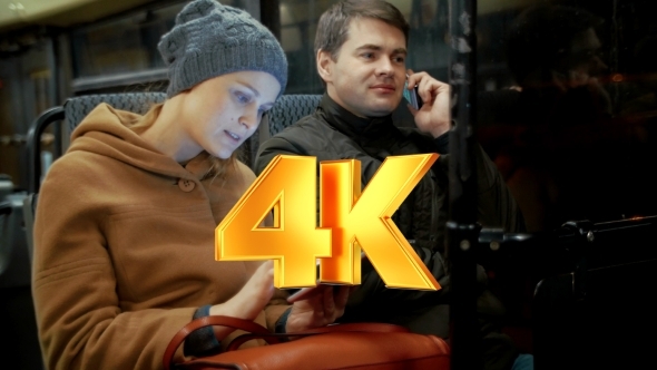 Bus Passengers Using Cellphone And Pad alt