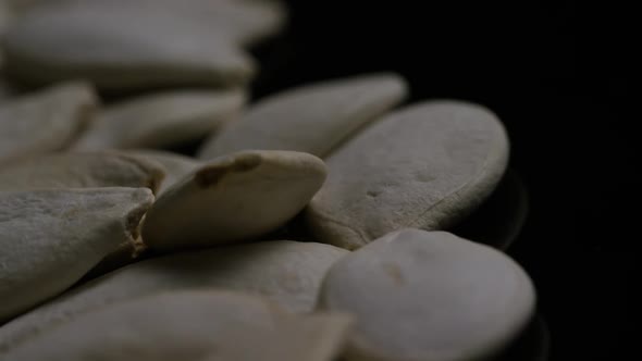 Cinematic, rotating shot of pumpking seeds - PUMPKIN SEEDS 020