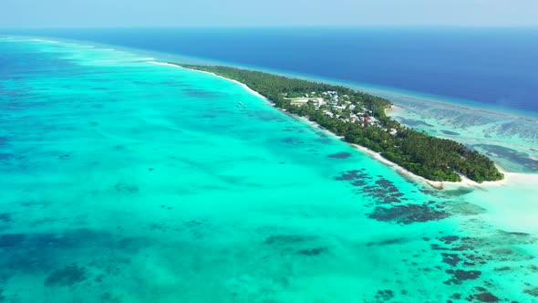 Aerial scenery of relaxing sea view beach wildlife by blue green lagoon with clean sand background o