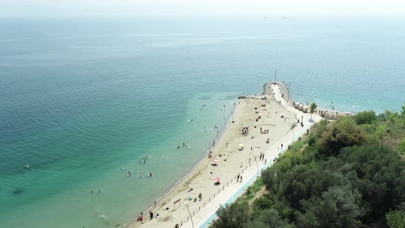 Sunny Day and People On The Beach