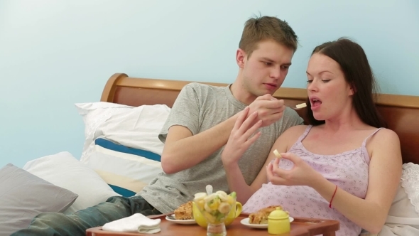 Family Breakfast In Bed