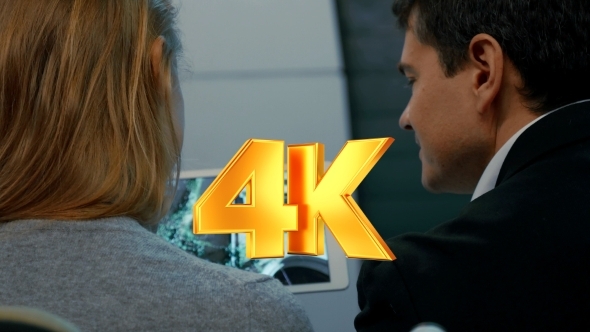 Two Architects Looking Through Exteriors On Pad alt