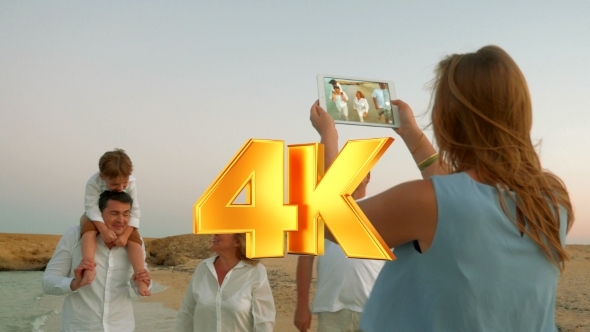 Using Pad To Take Shots Of Family On Vacation alt