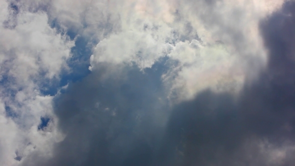 Moving Clouds And Blue Sky