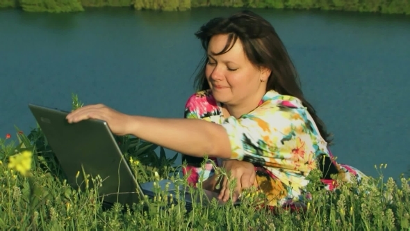 Laptop Near Lake alt