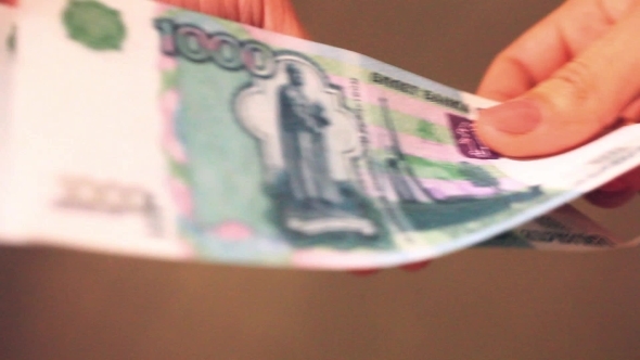 Women Hands Counting Russian Banknotes