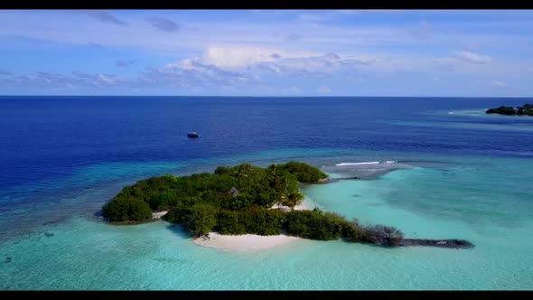 Aerial drone shot abstract of marine coast beach lifestyle by blue lagoon and white sandy background