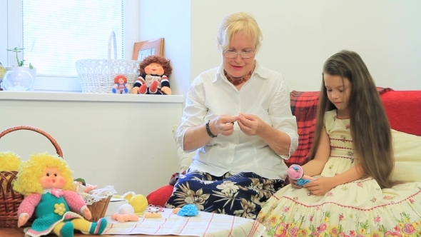 Grandmother Teaching Her Granddaughter