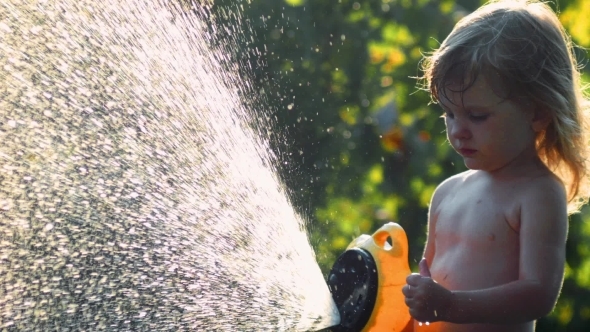 Girl Pours Water From a Hose alt