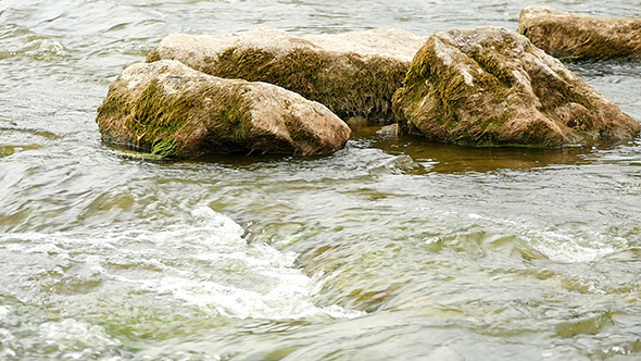 Fast Flowing River With Stones In Water alt