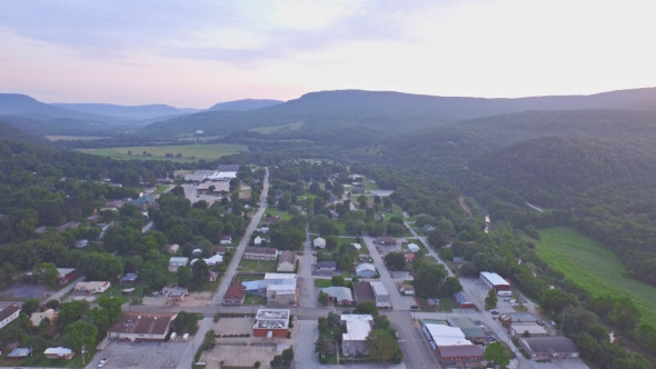 Aerial Rising Above Small Town