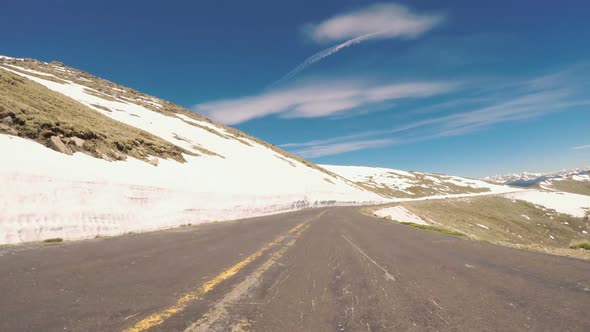 POV point of view -  Driving on alpine road of Mount Evans in Early Summer.