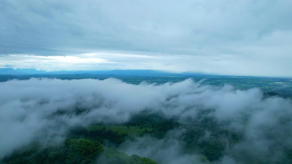 4K Aerial Drone shot flying over beautiful mountain ridge in rural jungle bush forest.