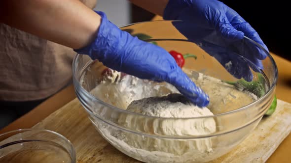 Knead the Dough with Blue Gloves