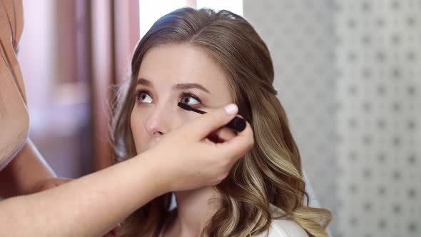 A Beautiful Girl with Long Hair Do Eye Makeup