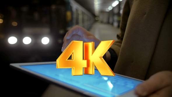 Woman Writing Letters On Tablet alt