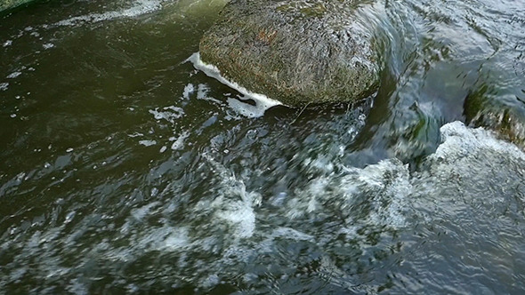 Fast Flowing River With Stones In Water alt