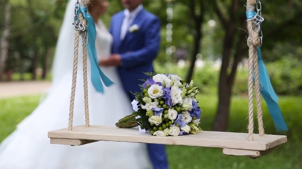 Bridal Bouquet On a Swing