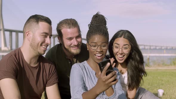 Happy Friends Taking Selfie with Smartphone at Park