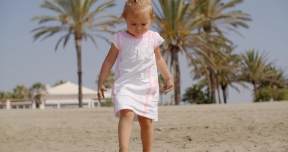 Little Girl Having Fun a Tropical Beach