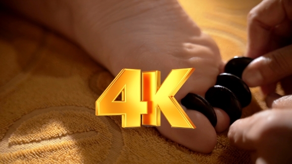 Hot Stone Massage Of Foot alt