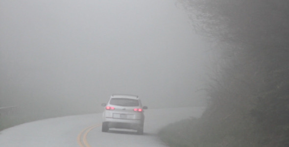 Car Driving on Foggy Mountain Road 1
