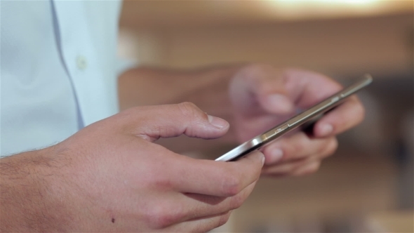 Man Using a Tablet alt