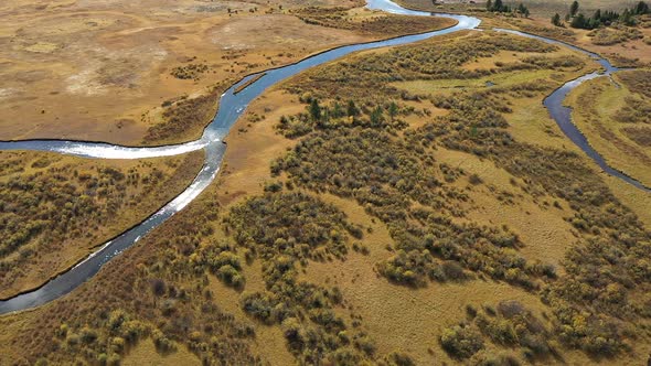 Flying over the Madison River as it winds through the landscape