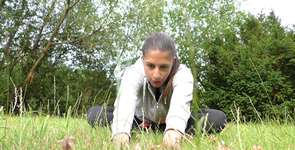 Young Woman Training on Grass in Nature 2