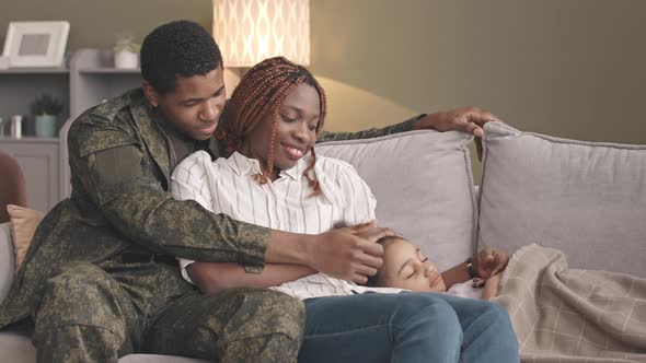 African American Soldier with Family at Home alt