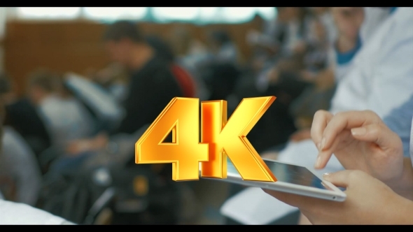 Woman Doctor Using Touch Pad On Medical Conference alt