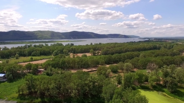 Camera Flies Over The Landscape And Church