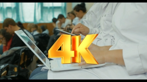 Medical Students Using Laptop And Pad On The alt