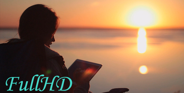 The Girl At Sunrise On The Tablet