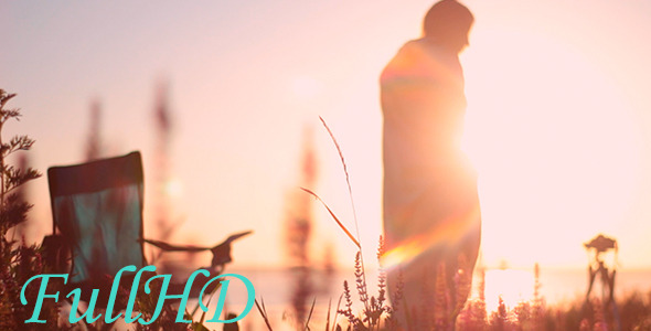 Woman Stands At Sunrise alt