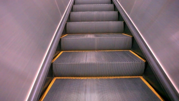 The Escalator Moving With Man. alt