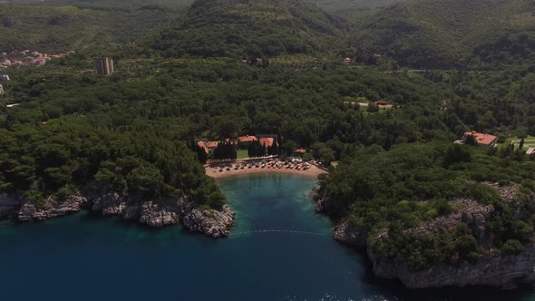 Top View of Queens Beach Near Milocer Villa with Mountains in the Background