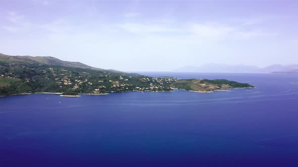 Corfu island mediterranean blue coast in sunny day. Aerial view