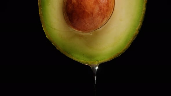 Avocado Half Isolated on Black Background Chroma Key Fresh Sliced Avocado Closeup