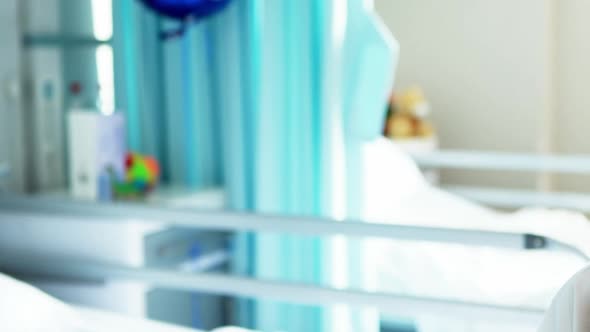 Girl smiling at camera in hospital