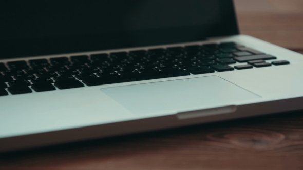 Laptop And Diary On The Desk alt