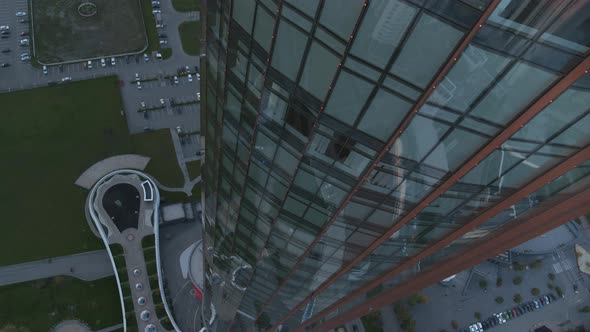 Aerial Top View of a Skyscraper with Glass Facade Building