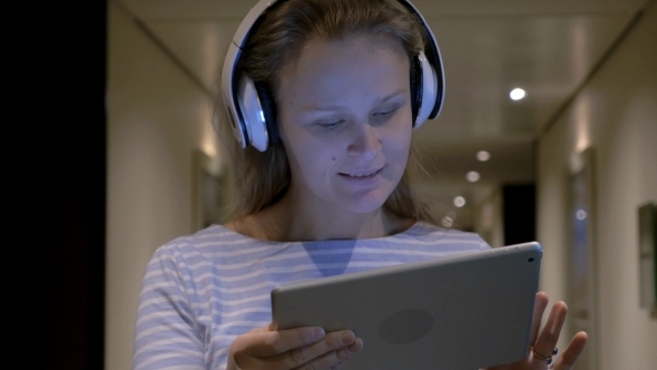 Woman In Headphondes Singing And Dancing With alt