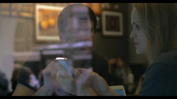 They Have Something To Discuss Using Cell Phone alt